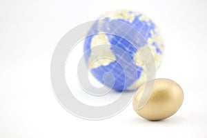 Gold egg with globe reflect modern world of global investments