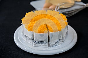 Gold Egg Yolk Thread Cakes on wooden plate