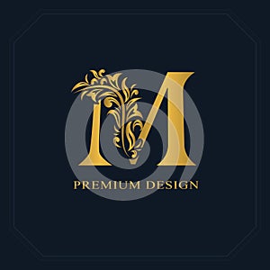 Gold Elegant letter M. Graceful style. Calligraphic beautiful logo. Vintage drawn emblem for book design, brand name, business car