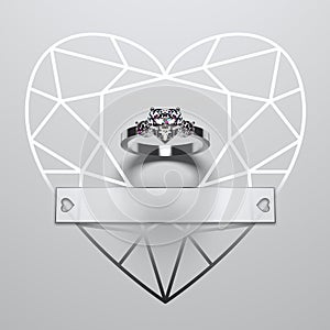 A gold engagement ring with a heart-shaped diamond on a white background with a heart-shaped embossment