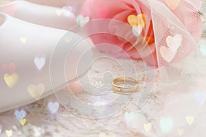 Gold engagement ring.White shoes. wedding shoes. Bride`s high heels. The fees of the bride. Wedding jewelry.