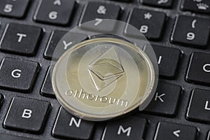 Gold Etherium Token On Keyboard