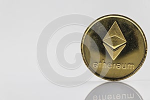 Gold Etherium Token with white background