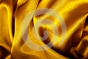 Gold fabric shiny abstract background