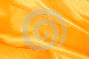 Gold fabric shiny abstract background
