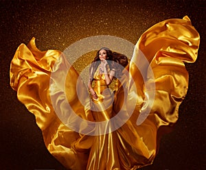 Gold Fashion Model Woman, Silk Fabric Flying Wings on Wind