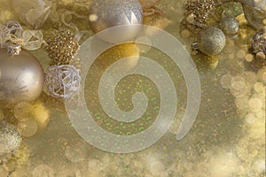 Gold Festive Christmas background. Christmas ball golden decoration.