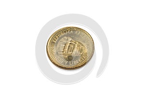 A gold fifty centavo coin from Argentina on a white background