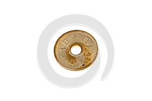 Gold Five Yen Coin Japanese on white background . Money Exchange and have meaning of Good luck . Luxury and fortune coins in Japan