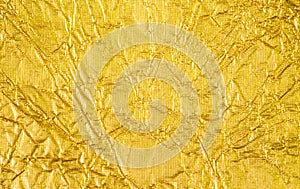 Gold foil abstract texture background. Element of design in your work background. Decoration for backdrop, wallpaper.
