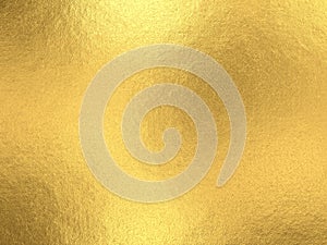 Gold foil background with light reflections.