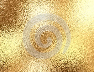 Gold foil background with light reflections