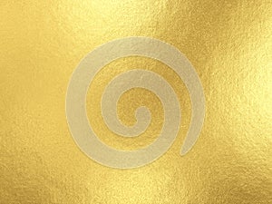 Gold foil background with light reflections