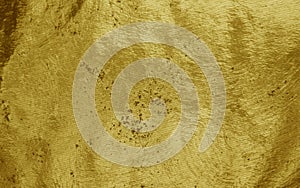 Gold foil background with rough texture