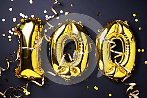 Gold foil balloon number, digit one hundred. Birthday greeting card with inscription 100. Anniversary celebration