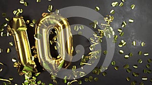 gold Foil balloon number ten or ten. Birthday greeting card with the inscription 10. black concrete background