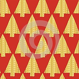 Gold foil christmas tree seamless vector pattern backdrop. Shiny golden textured triangle Christmas trees on red background.