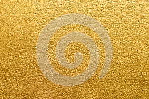 Gold foil texture. Golden abstract background photo