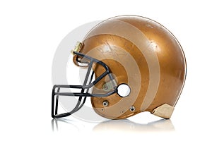 Gold football helmet on a white background