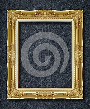 Gold frame on black slate background