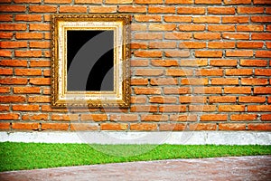 Gold frame on brick wall background