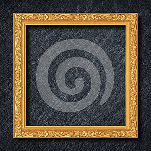 Gold frame on Dark grey black slate background or texture