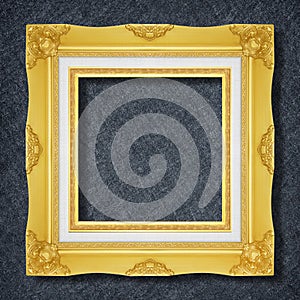 Gold frame on Dark grey black slate background or texture