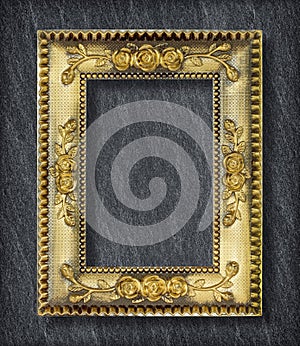 gold frame on Dark grey black slate background or texture
