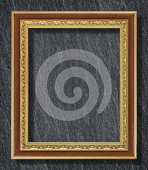 gold frame on Dark grey black slate background or texture