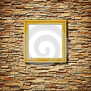 the Gold frame on decorative slate stone wall background