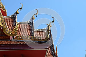 Gold gable apex the ornamental roof point at temple