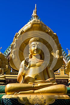 Gold Gautama Buddha statue monument