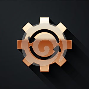 Gold Gear and arrows as workflow concept icon isolated on black background. Gear reload sign. Long shadow style. Vector