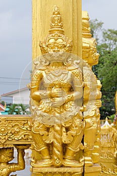 Gold giants statue.