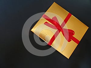 Gold gift box red ribbon - 1