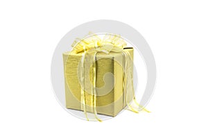 Gold gift box and ribbon isolated on white background