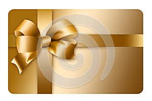 A gold gift card with a gold bow and ribbon is pictured here isolated on the background