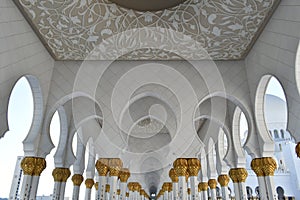 Gold gilted columns Sheikh Zayed Grand Mosque photo