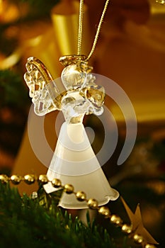 Gold glass Angel on the Christmas` tree