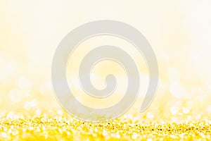 Gold glitter close-up background with shallow depth of field