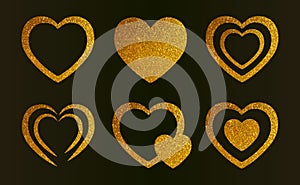 Gold glitter hearts set. Vector romantic shiny icons with sparkles for valentine\'s day isolated on black background