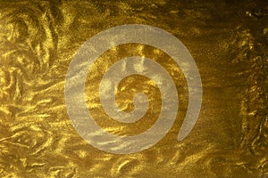 Gold glitter liquid flow texture background photo