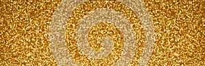 Gold glitter texture sparkling banner background. Abstract twinkled golden glittering background with bokeh, defocused lights for