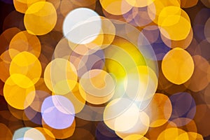 Gold glittering christmas lights. Blurred abstract background, close-up