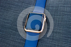 Gold golden blue smart watch turn off black screen close up