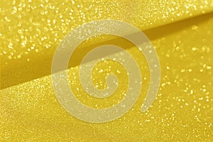 Gold and golden yellow glitter bokeh circle glow  blurred and blur abstract. Glittering shimmer bright luxury.