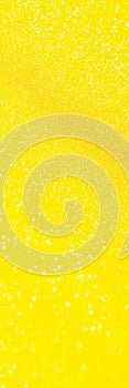 Gold and golden yellow glitter bokeh circle glow blurred and blur abstract. Glittering shimmer bright luxury .