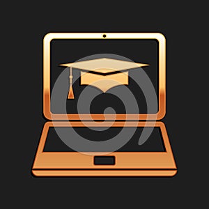 Gold Graduation cap and laptop icon. Online learning or e-learning concept icon isolated on black background. Long