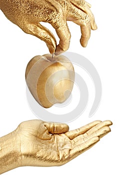 Gold hand giving apple