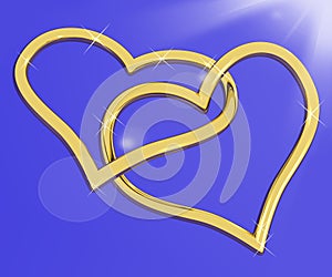 Gold Heart Shaped Rings On Blue